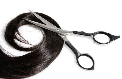 lock of hair with scissors